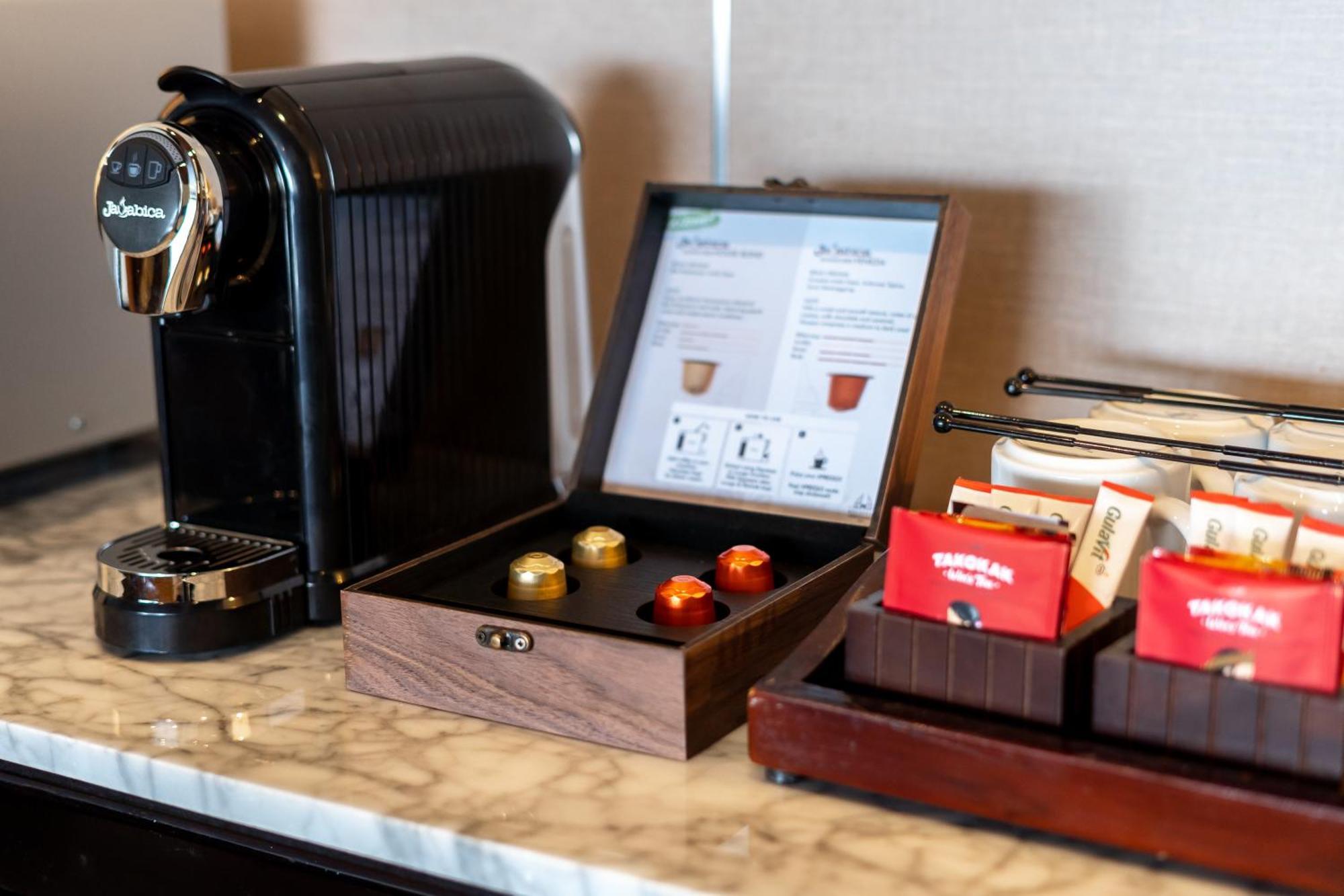 Discovery Kartika Plaza Hotel Kuta Lombok Kültér fotó A Nespresso coffee machine